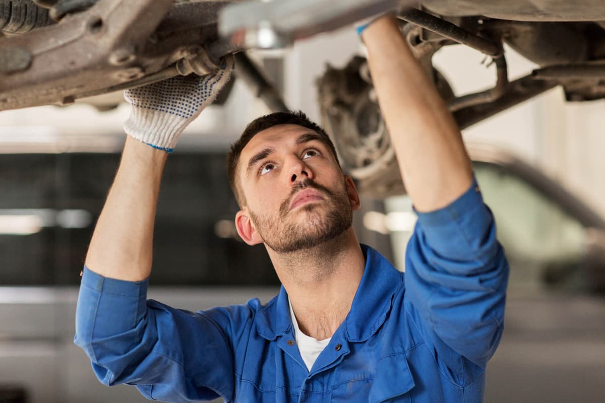 Mechanic working on a car
